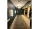 Hallway area featuring modern lighting fixtures, elevators, and neutral tones at 1100 Howell Mill Nw Rd # 708, Atlanta, GA 30318