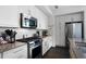 Bright kitchen with stainless steel appliances and white subway tile backsplash at 1100 Howell Mill Nw Rd # 708, Atlanta, GA 30318