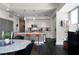 Open-concept kitchen and dining area with a breakfast bar and stainless steel appliances at 1100 Howell Mill Nw Rd # 708, Atlanta, GA 30318
