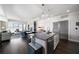 Bright open floor plan with large windows, comfortable seating, and a modern kitchen at 1100 Howell Mill Nw Rd # 708, Atlanta, GA 30318