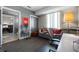 A neutral-toned room includes stylish decor, a comfortable couch, and an ensuite bathroom view at 1100 Howell Mill Nw Rd # 708, Atlanta, GA 30318