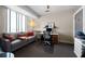 Spacious living room with modern furnishings, carpet, and a window at 1100 Howell Mill Nw Rd # 708, Atlanta, GA 30318