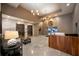 Spacious lobby featuring stylish lighting, a wooden reception desk, and tiled floors at 1100 Howell Mill Nw Rd # 708, Atlanta, GA 30318