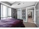 Well-lit bedroom with a large window, closet, and ensuite bathroom at 1100 Howell Mill Nw Rd # 708, Atlanta, GA 30318