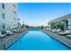 Scenic pool showcasing a spacious layout, inviting blue water, and relaxing lounging areas at 1100 Howell Mill Nw Rd # 708, Atlanta, GA 30318