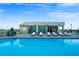 Tranquil pool scene featuring pristine blue water, comfortable loungers, and serene surroundings at 1100 Howell Mill Nw Rd # 708, Atlanta, GA 30318