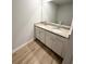 Bathroom with a granite double sink vanity and a view of the toilet and mirror at 111 Woodside Ct, Temple, GA 30179