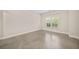 Neutral bedroom featuring a window with natural light and clean lines at 130 Staddlebridge Ave, Canton, GA 30114