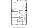 Detailed floor plan showcasing the layout of the first floor, highlighting the kitchen, dining, and living room at 130 Staddlebridge Ave, Canton, GA 30114