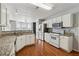 Bright kitchen featuring stainless steel appliances and beautiful granite countertops at 4030 Brushy Creek Way, Suwanee, GA 30024