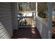 A covered back porch offers a comfortable spot to relax outdoors at 2568 Loghaven Nw Dr, Atlanta, GA 30318