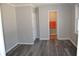 Cozy bedroom with view into bathroom at 2568 Loghaven Nw Dr, Atlanta, GA 30318