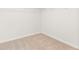 Empty walk-in closet featuring neutral carpeting and white walls, offering ample storage space at 4167 Viola Pl, Atlanta, GA 30349