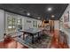 Finished basement featuring a ping pong table, wet bar and dark painted ceiling at 5382 Whitaker Nw Trl, Acworth, GA 30101