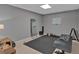 Basement gym with a rubber mat and weightlifting equipment at 5382 Whitaker Nw Trl, Acworth, GA 30101