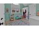Bright bathroom with large window, blue accents, and horse themed shower curtain at 5382 Whitaker Nw Trl, Acworth, GA 30101