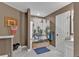 Bathroom featuring shower with unique curtain, hardwood floors, and basketball hoop at 5382 Whitaker Nw Trl, Acworth, GA 30101