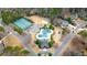 Aerial of community amenities including a pool, tennis courts, and playground at 5382 Whitaker Nw Trl, Acworth, GA 30101