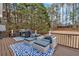 Back deck featuring outdoor furniture and a grill at 5382 Whitaker Nw Trl, Acworth, GA 30101