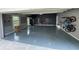 Spacious garage with ample storage, clean flooring, and organizational systems at 5382 Whitaker Nw Trl, Acworth, GA 30101