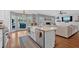 Bright, modern kitchen with stainless appliances overlooking the dining and living spaces at 5382 Whitaker Nw Trl, Acworth, GA 30101