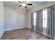 Bedroom with wood-look flooring and gray curtains at 96 Wheelers Dr, Dallas, GA 30157