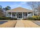 Front view of the community clubhouse with large porch at 2212 Austin Lake Se Dr, Smyrna, GA 30082