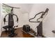 A well-equipped exercise room with modern fitness machines and hardwood floors at 238 Olympic Pl, Decatur, GA 30030