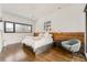 Main bedroom featuring hardwood floors, ceiling fan, and natural light at 238 Olympic Pl, Decatur, GA 30030