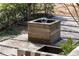 Tranquil water feature in backyard garden with stone accents at 238 Olympic Pl, Decatur, GA 30030