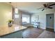 Bright dining area featuring an island with granite countertop and stainless steel appliances at 2886 Salmon Se Ave, Atlanta, GA 30317