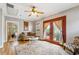 Cozy living room featuring hardwood floors, comfortable seating, and a decorative ceiling fan at 698 Bellemeade Nw Ave, Atlanta, GA 30318