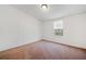 Neutral bedroom with carpet and a window offering ample natural light at 95 Riverbrooke Trl, Covington, GA 30016