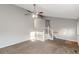 Bright living room featuring neutral walls, staircase, and a ceiling fan at 97 Spring Leaf Dr, Dallas, GA 30157