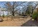 Large backyard with a mix of sunny and shaded areas, offering a peaceful retreat at 138 Kirkwood Ne Rd # 9, Atlanta, GA 30317