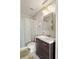 Neat bathroom with gray walls, updated lighting and a modern vanity at 138 Kirkwood Ne Rd # 9, Atlanta, GA 30317