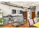 Kitchen with stainless appliances, island seating, and washer/dryer at 138 Kirkwood Ne Rd # 9, Atlanta, GA 30317
