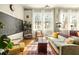 Sunlit living room featuring hardwood floors and a decorative rug at 138 Kirkwood Ne Rd # 9, Atlanta, GA 30317