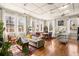 Bright living room with hardwood floors, large windows, and a comfortable seating area at 138 Kirkwood Ne Rd # 9, Atlanta, GA 30317
