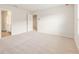 Carpeted bedroom with ample natural light and ensuite access at 4155 Viola Pl, Atlanta, GA 30349