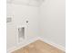 Bright and clean laundry room with tile flooring at 4155 Viola Pl, Atlanta, GA 30349