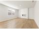 Bright living room featuring a modern fireplace and large window at 4155 Viola Pl, Atlanta, GA 30349