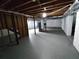 Unfinished basement with exposed beams and ductwork, offering potential for customization at 3230 Jamaica Nw Rd, Atlanta, GA 30318