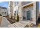 Beautiful new construction home with a green front door, stone accents and landscaped yard at 482 Hammons Way, Atlanta, GA 30315