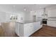 Open floor plan shows modern kitchen island with oven and stainless steel hood at 482 Hammons Way, Atlanta, GA 30315