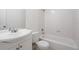 A bright bathroom features a shower-tub combo at 6080 Indian Wood Se Cir, Mableton, GA 30126