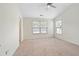 Carpeted bedroom with two windows allowing ample natural light at 6080 Indian Wood Se Cir, Mableton, GA 30126