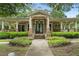 Welcoming community center with covered porch, beautiful landscaping and a stone facade at 6080 Indian Wood Se Cir, Mableton, GA 30126