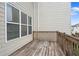 Wooden deck shows railing, view of yard, and provides an outdoor space for relaxation at 6080 Indian Wood Se Cir, Mableton, GA 30126