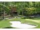 This beautiful backyard putting green offers the perfect setting for relaxation or entertaining at 4615 Northside Dr, Atlanta, GA 30327